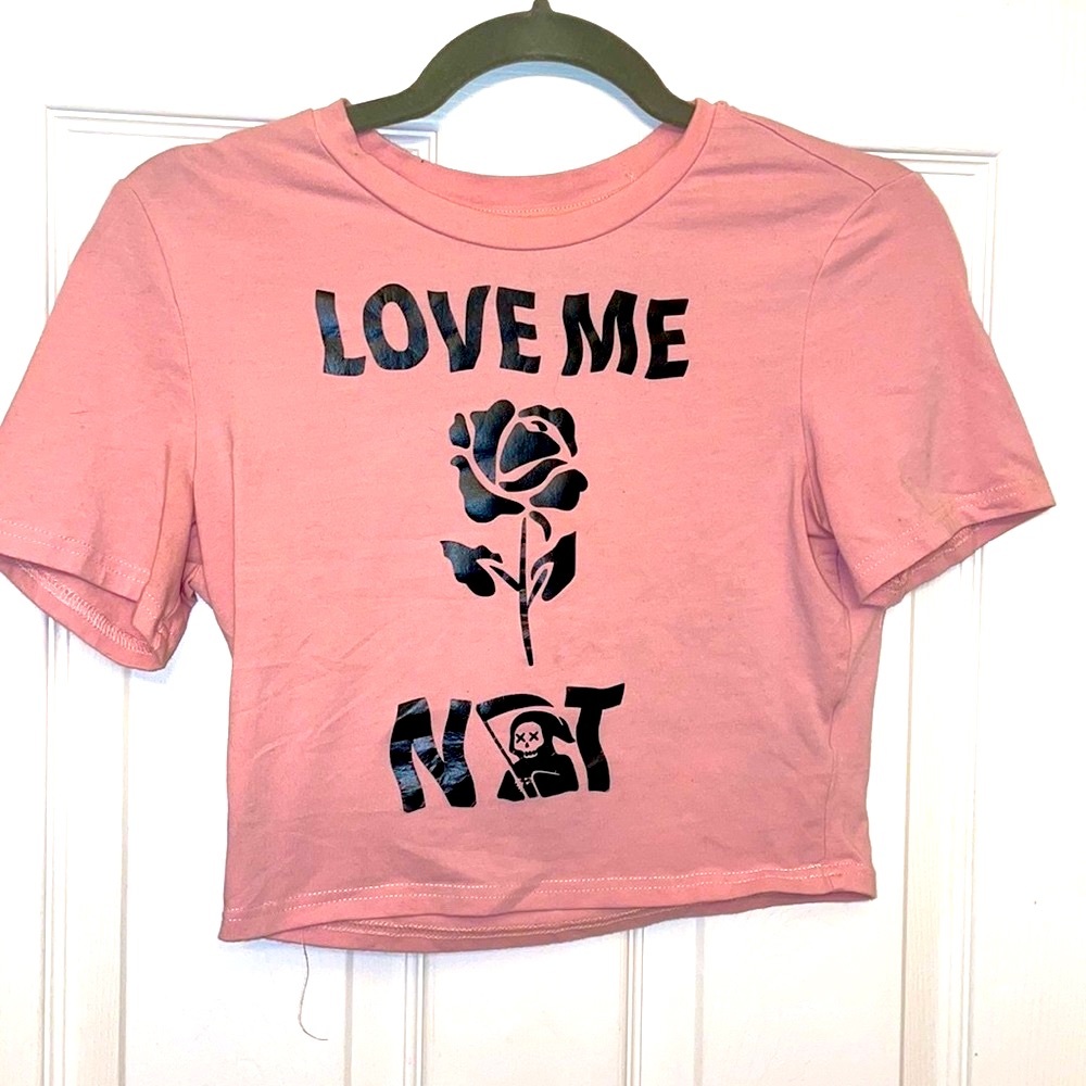 Light pink crop top “love me not” with a rose and grim reaper decor.